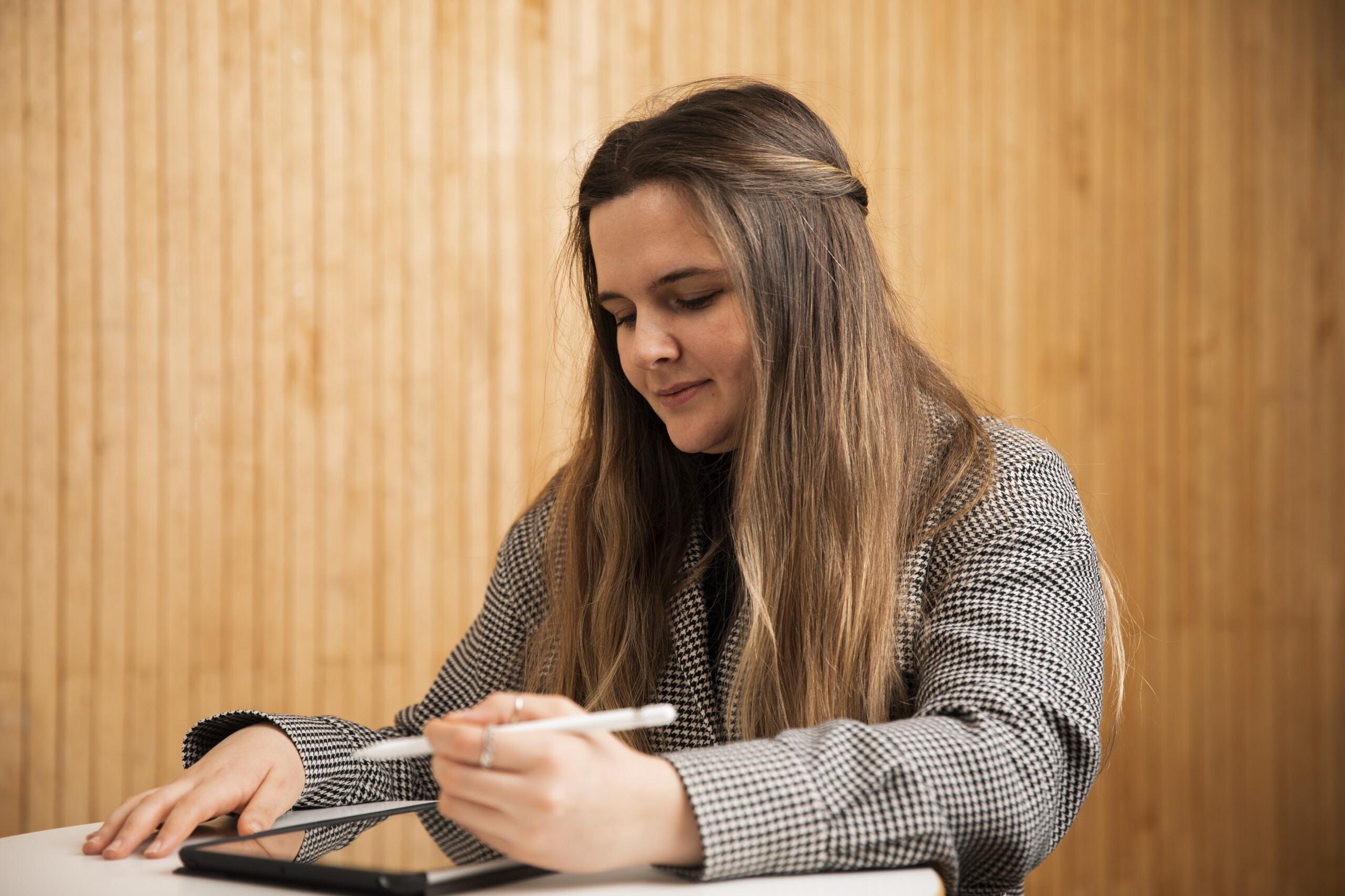 Picture of a person studying.